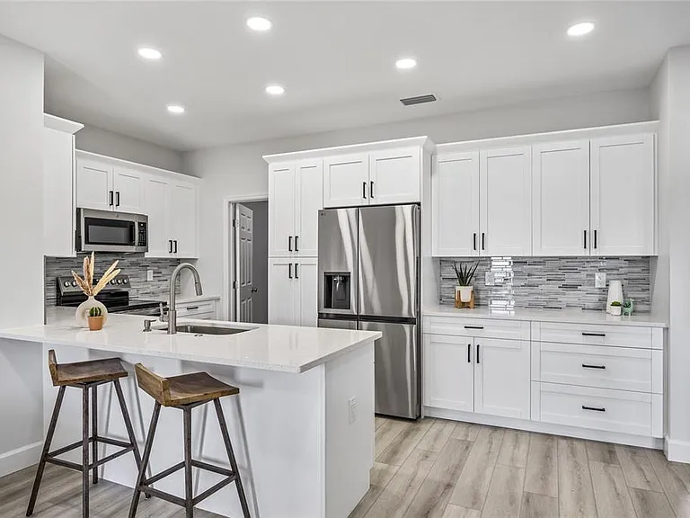 New Construction Duplex for Sale in Madeira Beach | Bay Views & Income Potential!