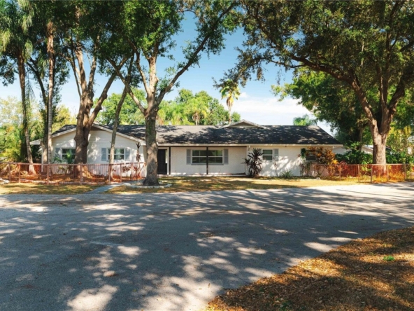 15509 Casey Rd | Carrollwood Estate with Income Potential & Development Opportunity
